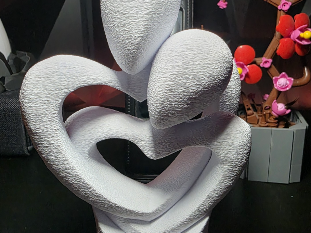 Escultura Casal Entrelaçado